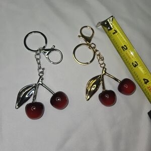 Elegant Cherry Keychain Duo - Silver and Gold